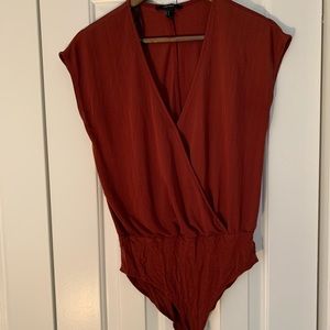 Deep cut bodysuit